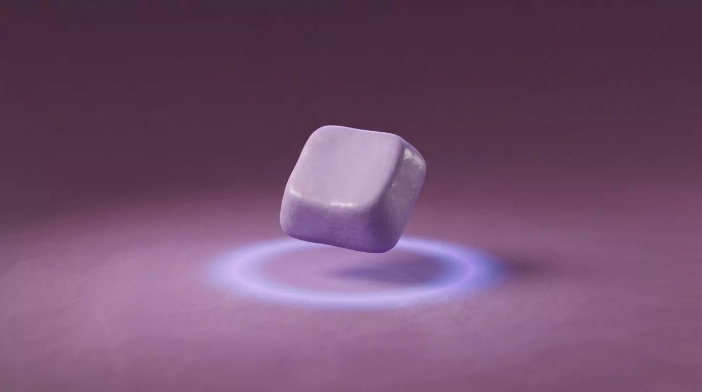 Clay keyboard key glowing above a bare desk, showing computer use without a mouse