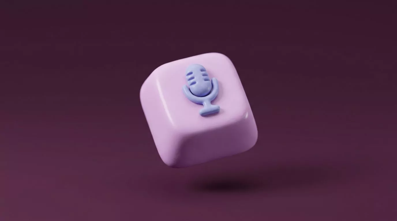 Soft clay style keyboard key with a microphone on top, the Windows dictation shortcut